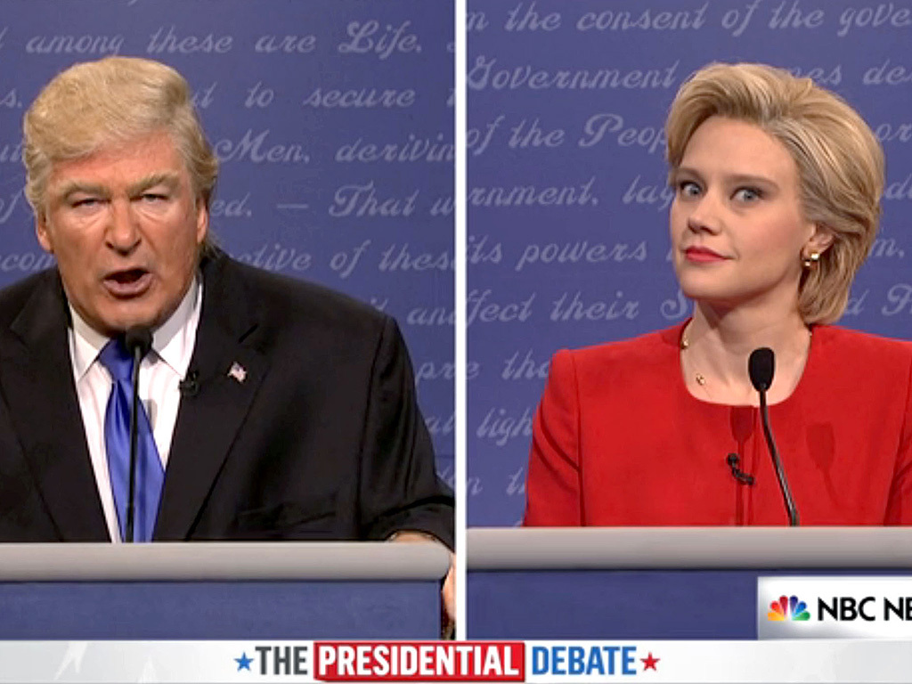 http://www.hulu.com/watch/989179 Screengrab of Alec Baldwin and Kate McKinnon playing Donald Trump and Hillary Clinton in a debate skit 10/2/16 Source: Saturday Night Live/Hulu